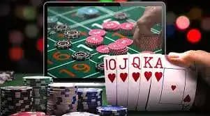 Filipino player using jl app on a mobile phone for sports betting and casino games